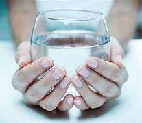 Image result for Sad Girl Holding Glass Water