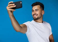 Image result for Stock of Someone Taking a Selfie