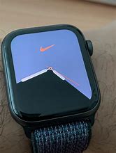 Image result for Apple Watch Nike Hyper Crimson Neptune Green MacRumors