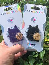 Image result for Cat Pop Sockets for Phone