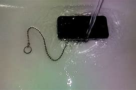 Image result for iPhone 4S in Water