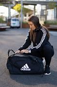 Image result for Adidas Workers Packing Pic