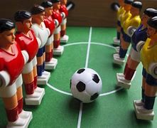 Image result for Foosball Table Players