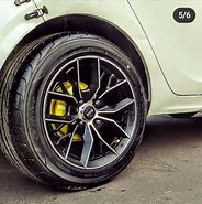 Image result for Tata Tiago Alloy Wheels
