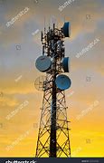 Image result for A Picture of a Telecom Worker On a Cell Phone Tower