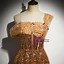 Image result for Gold Corset Prom Dress