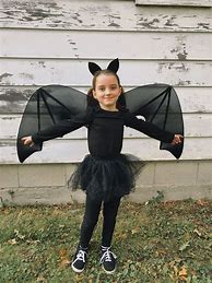 Image result for Guy Wearing a Dress with Bat