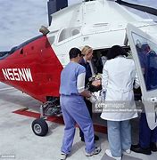Image result for Doctor Lifting Patient