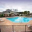 Image result for Landscaping around Pool Fence