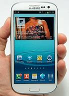 Image result for iPhone and Samsung Galaxy S3 Size