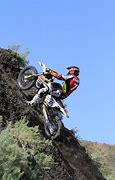 Image result for Dirt Bike Climing a Hill