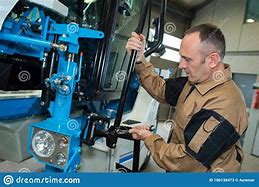 Image result for Guy Fixing Machine
