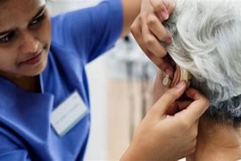 Image result for People Wearing Hearing Aids