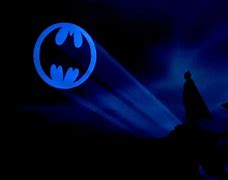 Image result for Batman with Bat Signal On Him
