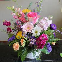 Image result for White Basket of Brightly Colored Flowers