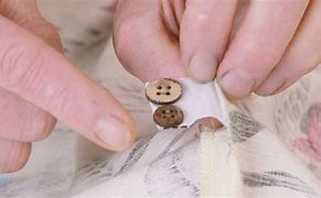 Image result for Directions for Sewing On Buttons