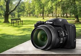 Image result for Nikon Coolpix B600 vs iPhone 11 Camera