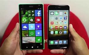 Image result for Lumia 1520 vs iPhone 6 Plus