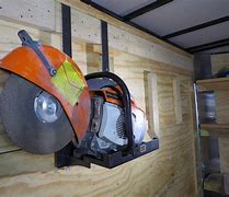 Image result for Enclosed Trailer Chainsaw Holder