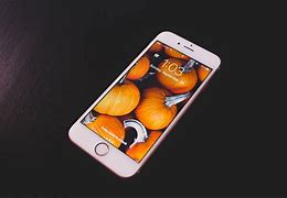 Image result for iPhone 8 Plus Gold in Hand