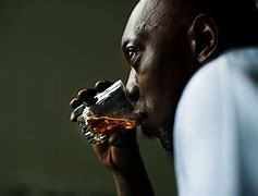 Image result for African Father Drinking Alcohol