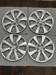 Image result for Toyota Corolla Black Hubcaps