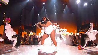 Image result for Lizzo Blowin a Flute