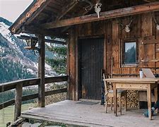 Image result for Man Working Outside a Cabin