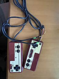 Image result for Red Famicom Controllers