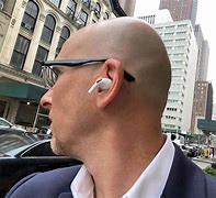 Image result for Person Wearing Apple EarPods
