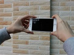 Image result for iPhone 6s Held in Hand