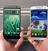 Image result for HTC One M7 vs Galaxy S4 vs iPhone 5S