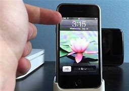 Image result for iPhone 1st Generation in Hand