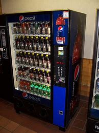 Image result for Thin Pepsi Machine