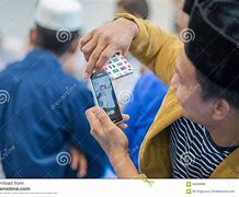 Image result for iPhone Use Nepali Men