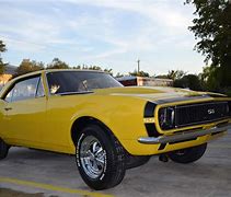 Image result for Yellow 67 Camaro