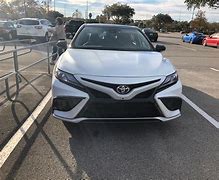 Image result for White Camry Next to Back Front Top