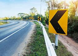 Image result for Curving Road Sign