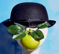 Image result for Man with Bowler Hat and Apple