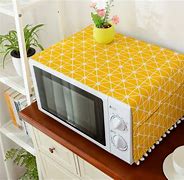 Image result for Microwave Oven with Yellow Light Inside