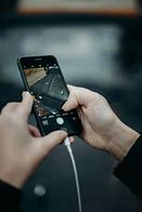 Image result for Black iPhone On Table