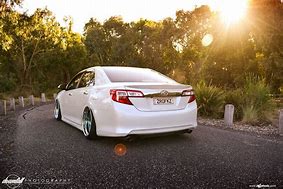 Image result for White Toyota Camry with Rims