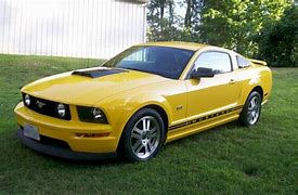 Image result for PICTURES OF THE 2005 YELLOW MUSTANGS