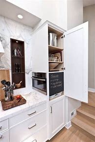 Image result for Hideaway Microwave Cabinet