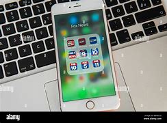 Image result for iPhone with News Media Logos Coming Out of It