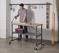 Image result for Adjustable Height Work Table Automotive