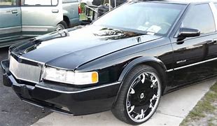 Image result for Cadillac STS Black Rims
