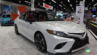 Image result for 2020 Toyota Camry XSE V6 White with Red Interior