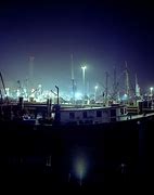 Image result for Sitting in a Fishing Boat at Night