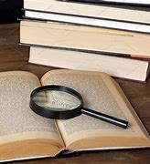 Image result for Book with Magnifying Glass